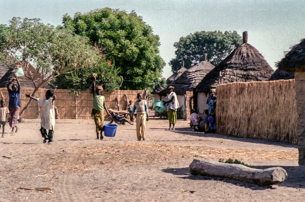 Community members in a village setting (representative photo, Senegal)